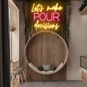 Glowing "Let's Make Pour Decisions" Neon Sign